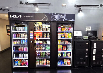 Magnetic header cooler display for Kia of Cape Coral service lounge, great for micro markets, vending machines, and AI coolers